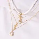 Collar multi cadenas de estilo ibicenco con multiples colgantes
