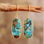 Pendientes ibicencos de turquesa con metal dorado