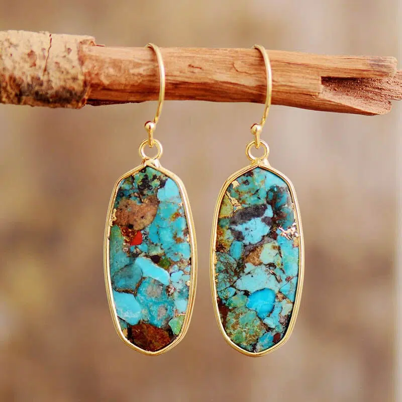 Pendientes ibicencos de turquesa con metal dorado