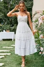Vestido blanco de fiesta ibicenca con detalles calados y escote